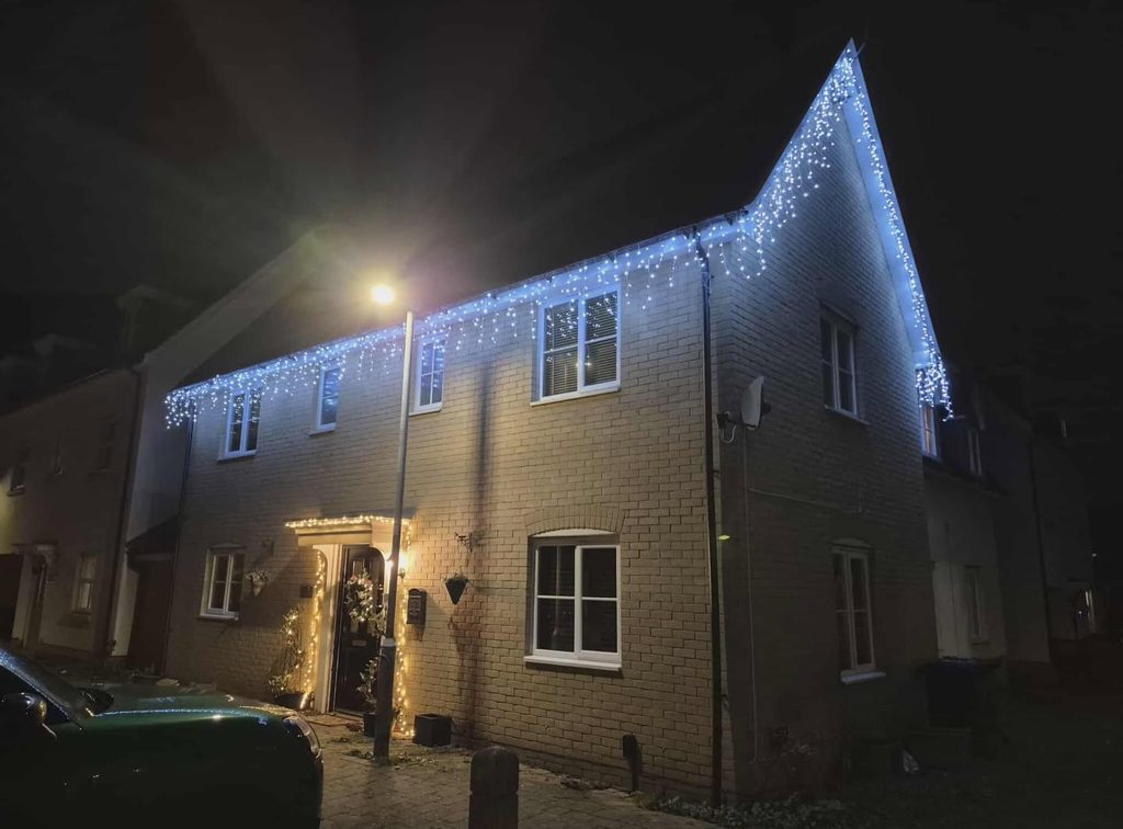 Christmas lights installed on a property in North Essex